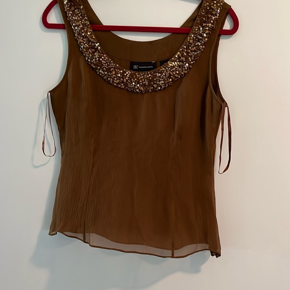 Simplicity and sophistication this sweet little blouse